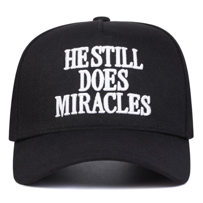 HE STILL DOES MIRACLES Embroidered Trucker Hat