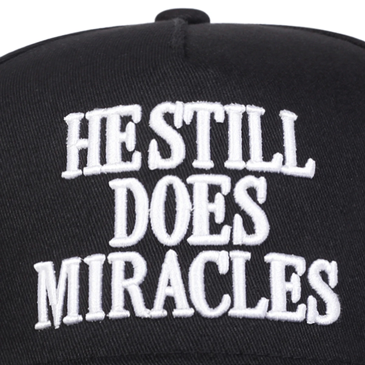 HE STILL DOES MIRACLES Embroidered Trucker Hat